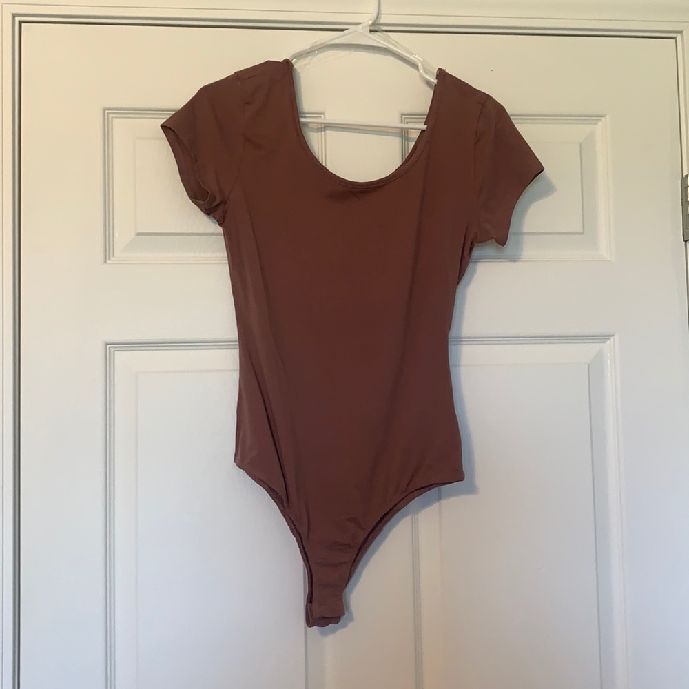 NEW boutique mauve bodysuit